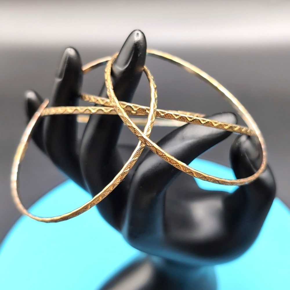 4 Gold Toned Textured Pattern Bangle Jingle Bracelets